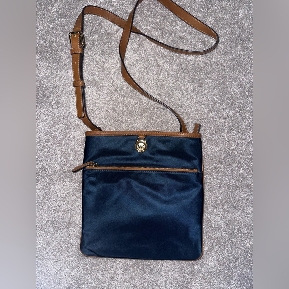 Like new Michael Kors nylon crossbody purse bag navy blue with leather trim